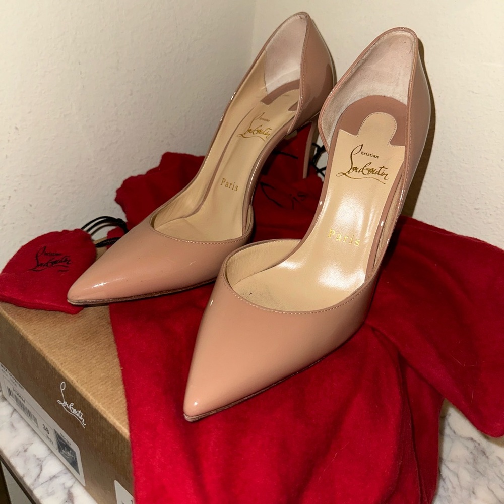 Christian Louboutin
Iriza Patent 100mm Half-d'Orsay Red Sole High-Heel Pumps